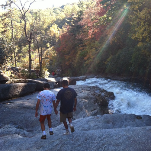 Nicholas and Ray Hemachandra at the top of Rainbow Falls (Photo by Heather Holt Hill)
