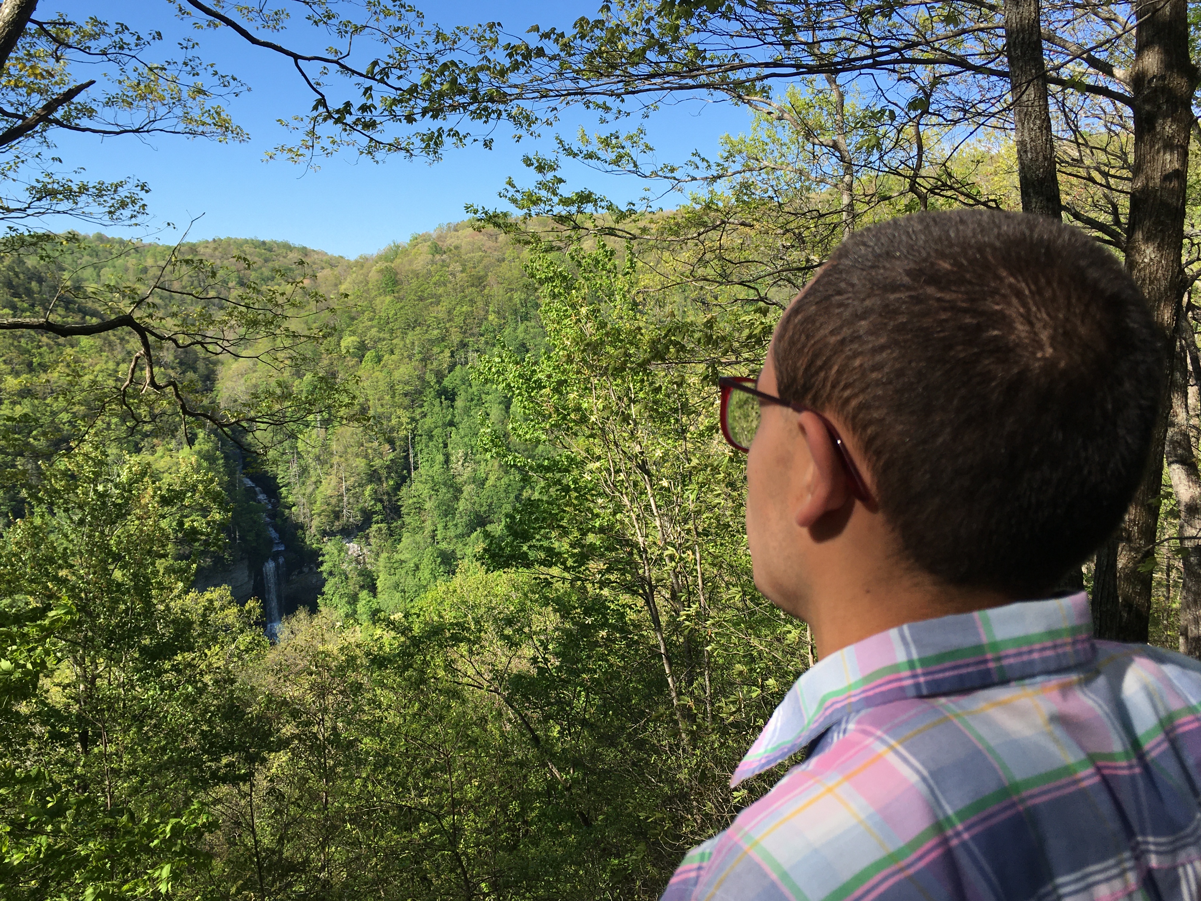 Nicholas Hemachandra looking out at Raven Cliff Falls in South Carolina, May 2020
