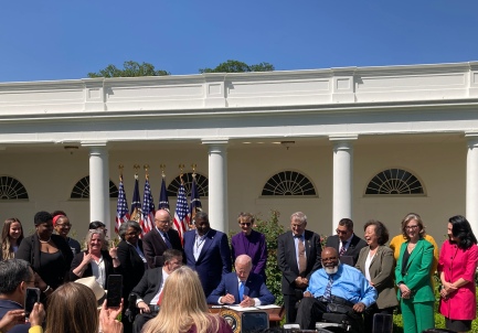 President Biden signing a multi-part Executive Order in support of care workers and family caregivers on April 18, 2023.